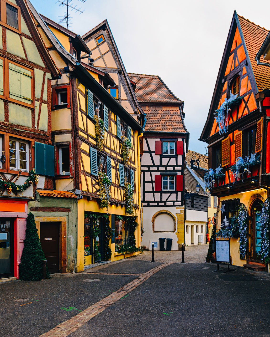 A sunlit European village street