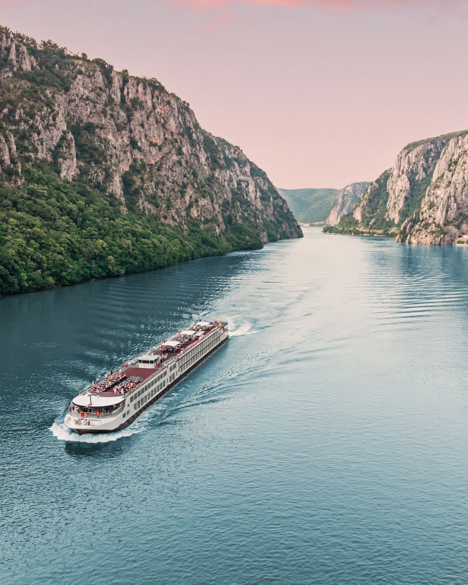 A river cruise ship sailing through Europe